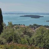 Garden villa wedding Italy. View over Lake Trasimeno and the Islands directly from the Villa.