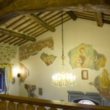 italy wedding venues. Detail of the fresco of Saint Marie on the wall in front of the bedroom.