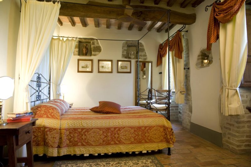 One of the bedrooms and bed in Villa 2. wedding villa tuscany