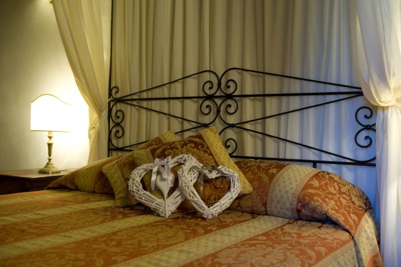 Details of the bed header, each piece of furniture has been carefully selected. wedding villa tuscany