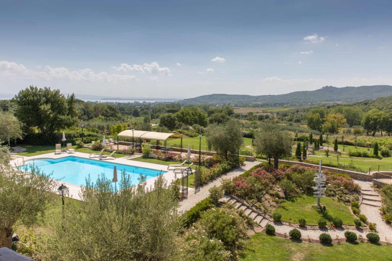 The Pool area and magnificent garden of Villa Baroncino.