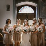 Bride and bridesmaids in the chapel of Villa San Crispolto