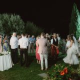 Bridal couple and their guests in the garden at Villa San Crispolto